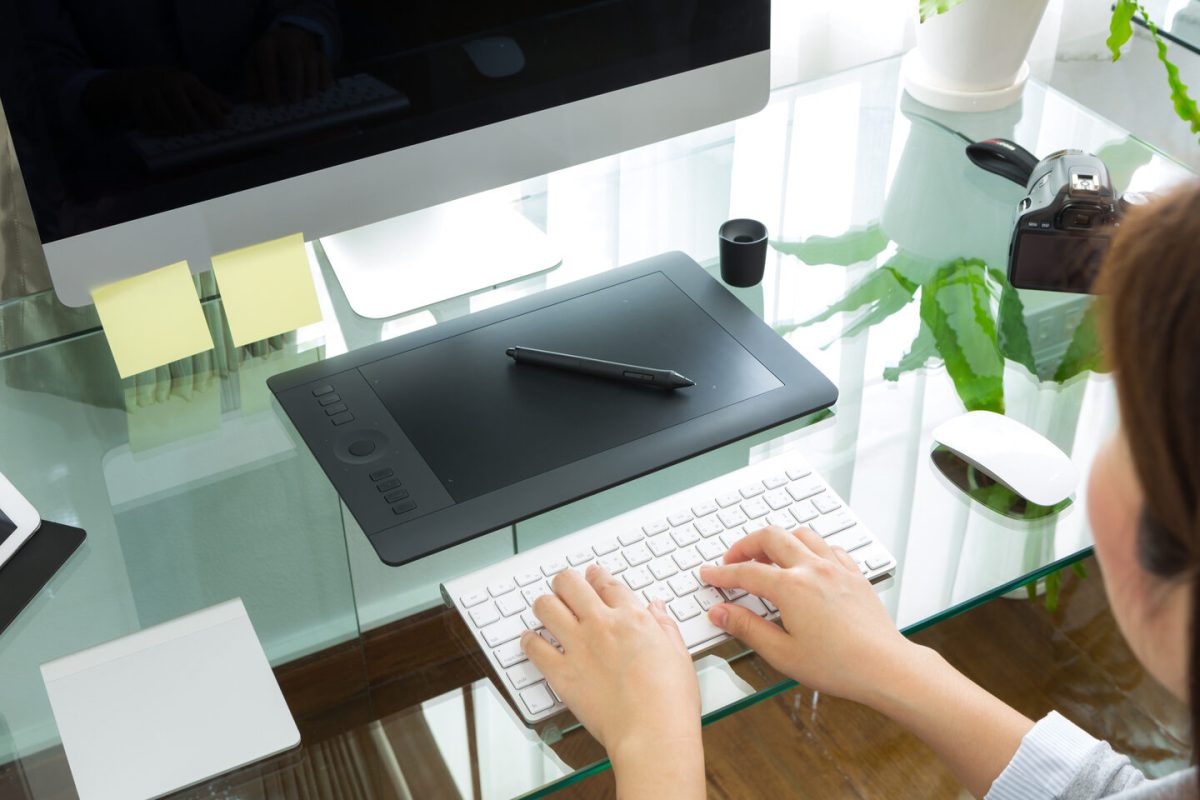 Closeup of business woman hand typing on keyboard computer