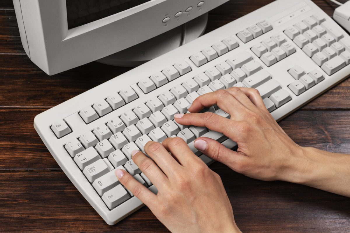 person-using-retro-computer (1) (1)